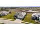 A breathtaking aerial view shows a house with expansive lawns at 11140 Hogan Cir, Englewood, FL 34223