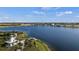 Scenic aerial view of a tranquil lake and well-planned community, a perfect blend of nature at 11140 Hogan Cir, Englewood, FL 34223