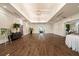Expansive ballroom with hardwood floors, recessed lighting, and versatile space for large events and special occasions at 11140 Hogan Cir, Englewood, FL 34223