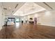 Spacious event space featuring hardwood floors, elegant lighting, and ample room for gatherings and celebrations at 11140 Hogan Cir, Englewood, FL 34223