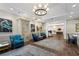 Beautiful lobby area featuring stylish seating, decor, and hardwood flooring, creating an inviting entrance at 11140 Hogan Cir, Englewood, FL 34223