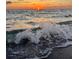 Sunset on the water with the horizon at 11140 Hogan Cir, Englewood, FL 34223