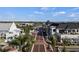 Beautiful street with palm trees and retail stores providing a desirable neighborhood at 11140 Hogan Cir, Englewood, FL 34223