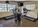 Well-equipped fitness center featuring treadmills and elliptical machines at 115 White Oak Way, Sarasota, FL 34237