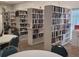Community library with a wide selection of books and comfortable seating at 115 White Oak Way, Sarasota, FL 34237