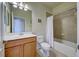 Clean bathroom with tub shower, toilet and vanity at 11692 Spotted Margay Ave, Venice, FL 34292