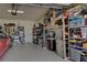 Organized garage with storage shelves and work bench at 11692 Spotted Margay Ave, Venice, FL 34292