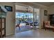 View of the pool and patio from the sliding glass doors at 11692 Spotted Margay Ave, Venice, FL 34292