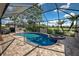 Enclosed pool and spa with brick pavers at 11692 Spotted Margay Ave, Venice, FL 34292