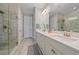 Double vanity bathroom with a large walk-in shower at 12029 Tapestry Ln, Venice, FL 34293