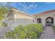 Inviting exterior with a landscaped walkway leading to the front entrance at 12029 Tapestry Ln, Venice, FL 34293