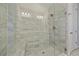 Large walk-in shower with a built-in seat at 12029 Tapestry Ln, Venice, FL 34293