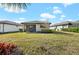 Home exterior view with spacious backyard at 12861 Oriago St, Venice, FL 34293