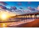 Scenic pier extending over the ocean at sunset at 12861 Oriago St, Venice, FL 34293