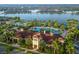 Large community clubhouse near pool and lake at 12861 Oriago St, Venice, FL 34293