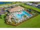 Resort-style community pool with lounge area at 12861 Oriago St, Venice, FL 34293