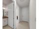 Clean hallway with tiled floor and access to rooms at 12861 Oriago St, Venice, FL 34293