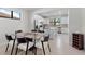 Modern kitchen with stainless steel appliances and granite countertops at 12861 Oriago St, Venice, FL 34293