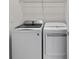 Laundry room with washer and dryer included at 12861 Oriago St, Venice, FL 34293