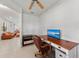 Bright home office with wood desk and leather chair at 12861 Oriago St, Venice, FL 34293