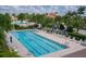 Resort-style pool with lap lanes and plenty of lounge chairs at 12861 Oriago St, Venice, FL 34293