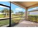 Screened porch overlooking backyard at 12861 Oriago St, Venice, FL 34293