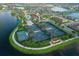 Eight well-maintained tennis courts near lake at 12861 Oriago St, Venice, FL 34293
