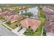 Bird's-eye view of a villa community near a lake at 1375 Maseno Dr, Venice, FL 34292