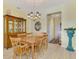Formal dining room features a wood table and six chairs, plus a hutch at 1375 Maseno Dr, Venice, FL 34292