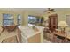 Open kitchen features a breakfast bar and view into the living room at 1375 Maseno Dr, Venice, FL 34292