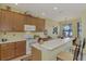Kitchen with updated appliances and an eat-in dining area at 1375 Maseno Dr, Venice, FL 34292