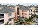 Attractive three-story building with tiled roofs and balconies at 1602 Gondola Park Dr # 1602, Venice, FL 34292