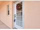 Condo front door with a decorative wreath at 1602 Gondola Park Dr # 1602, Venice, FL 34292