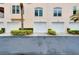 Row of attached garages with landscaping at 1602 Gondola Park Dr # 1602, Venice, FL 34292