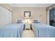 Two twin beds, nightstand, and ample closet space at 1602 Gondola Park Dr # 1602, Venice, FL 34292