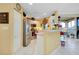 Well-equipped kitchen with white cabinets and stainless steel appliances at 1602 Gondola Park Dr # 1602, Venice, FL 34292