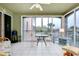 Relaxing lanai with outdoor furniture and view of community at 1602 Gondola Park Dr # 1602, Venice, FL 34292