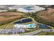 Aerial view of community amenities including pool and tennis at 17953 Grand Prosperity Dr, Venice, FL 34293