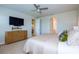 King bedroom with ensuite bathroom and walk-in closet at 17953 Grand Prosperity Dr, Venice, FL 34293