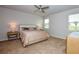 Spacious bedroom with carpeted floors and ceiling fan at 17953 Grand Prosperity Dr, Venice, FL 34293