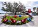 Inviting community space with colorful Adirondack chairs, perfect for relaxing outdoors at 17953 Grand Prosperity Dr, Venice, FL 34293