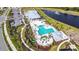 Resort-style pool with lounge chairs and cabanas at 17953 Grand Prosperity Dr, Venice, FL 34293