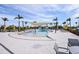 Community pool with shade structures and lounge chairs at 17953 Grand Prosperity Dr, Venice, FL 34293