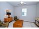 Relaxing sitting area with two armchairs and ottoman at 17953 Grand Prosperity Dr, Venice, FL 34293