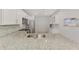 Kitchen featuring granite countertops, stainless steel appliances, and ample cabinet space at 18861 Bianchi St, Venice, FL 34293
