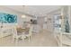 Open-concept living room flows into the kitchen, creating a great space for entertaining at 18861 Bianchi St, Venice, FL 34293