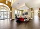 Comfortable lobby with rich flooring, contemporary furniture, neutral paint, and stone accents at 18861 Bianchi St, Venice, FL 34293