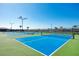 Well-maintained tennis courts ready for a match, offering a great amenity for active residents at 18861 Bianchi St, Venice, FL 34293