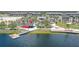 Scenic aerial view showcasing a vibrant waterfront community with modern amenities and stunning water access at 20590 Granlago Dr, Venice, FL 34293
