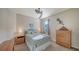 Comfortable bedroom with nice furnishings and sunlight at 20590 Granlago Dr, Venice, FL 34293